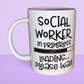 A white ceramic mug with the text 'Social Worker in progress Loading... Please wait' printed on it.