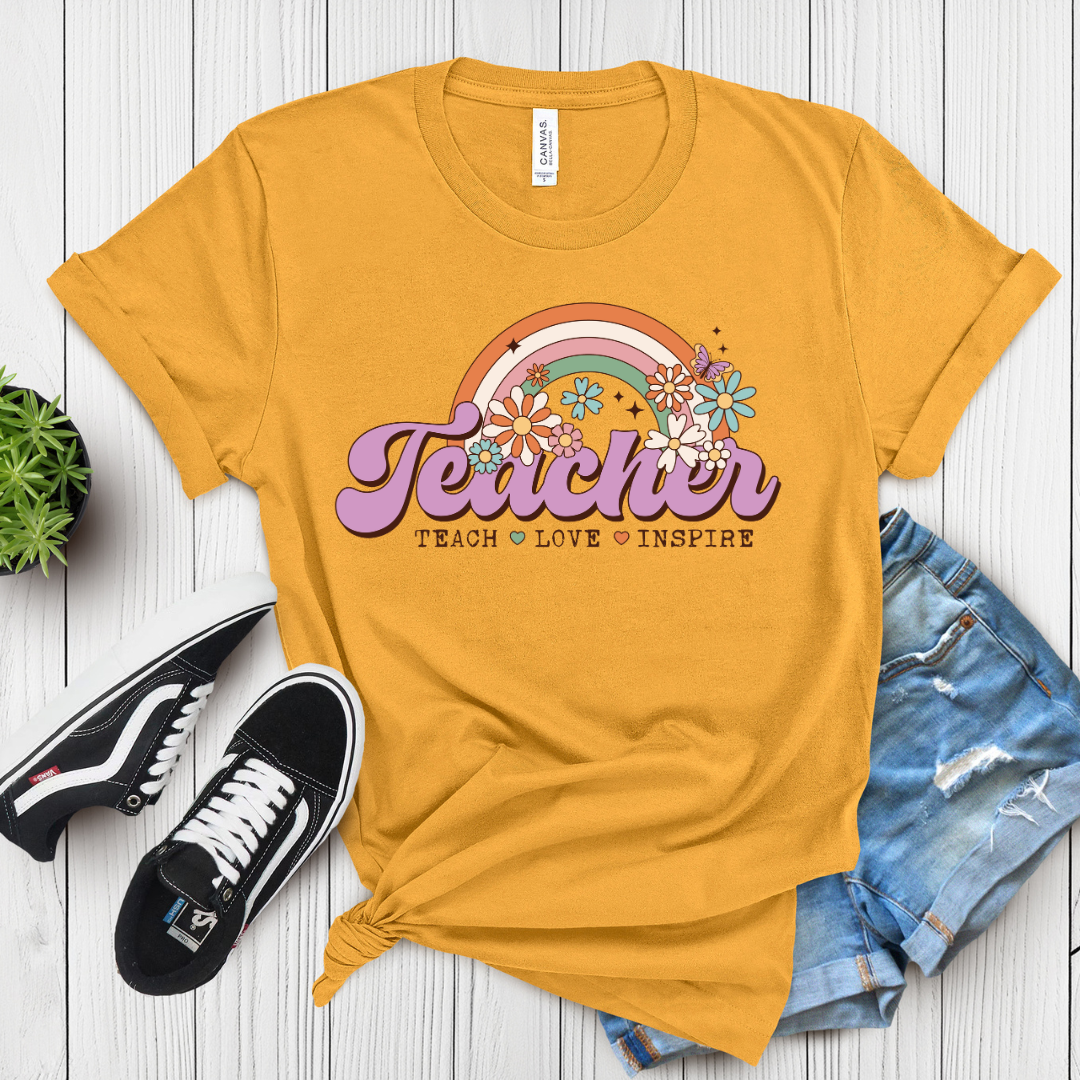 A gray t-shirt with the text 'Teacher. Teach.