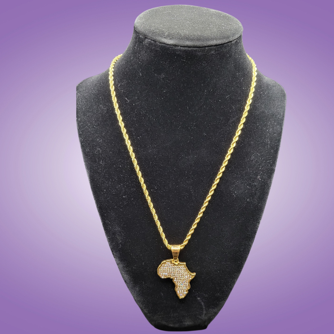 A gold-plated Africa-shaped pendant necklace with a rhinestone crystal accent on a rope chain.
