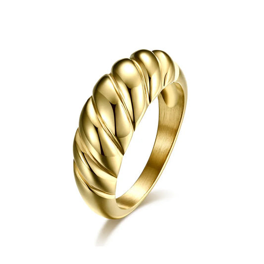 A domed croissant-style band ring in gold, with a smooth, curved silhouette.
