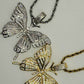 Silver and gold butterfly pendent and necklace.