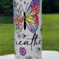 Tumbler with butterfly design and 'Just Breathe' text on a white background
