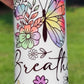 20oz tumbler with floral and butterfly design and 'Just Breathe' text 