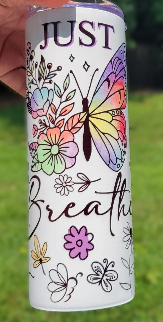20oz tumbler with floral and butterfly design and 'Just Breathe' text 